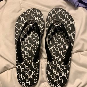 Womens Michael Kors flip flops and a pair of cute strappy sandals